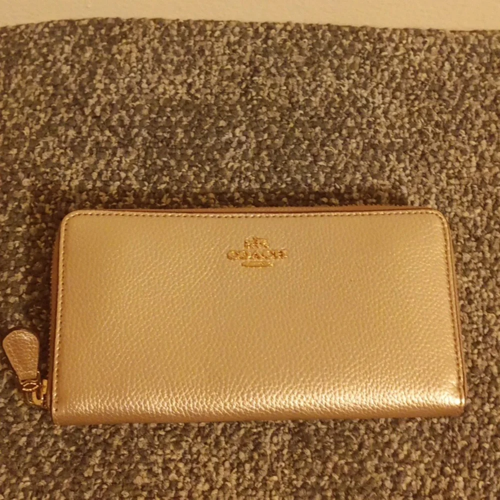 Coach gold pebbled leather accordion wallet